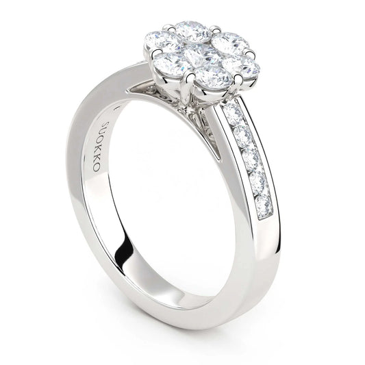 Suokko Timanttikorut -timanttisormus valkokultaa, jossa istutettuna 17 timanttia. Tuotekoodi KR10268