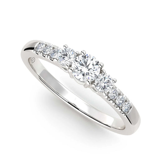 Suokko Timanttikorut -timanttisormus valkokultaa, jossa istutettuna 9 timanttia. Tuotekoodi KR14459BR20