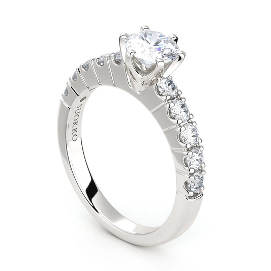 Suokko Timanttikorut -timanttisormus valkokultaa, jossa istutettuna 11 timanttia. Tuotekoodi KR18132BR65