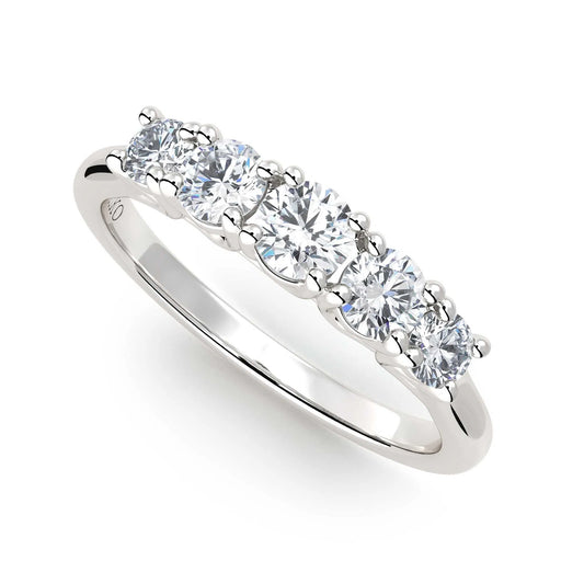 Suokko Timanttikorut -timanttisormus valkokultaa, jossa istutettuna 5 timanttia. Tuotekoodi KR18445BR20