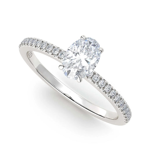 Suokko Timanttikorut -timanttisormus valkokultaa, jossa istutettuna 25 timanttia. Tuotekoodi KR19038OV75