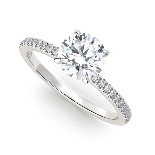 Suokko Timanttikorut -timanttisormus valkokultaa, jossa istutettuna 25 timanttia. Tuotekoodi KR19039BR100