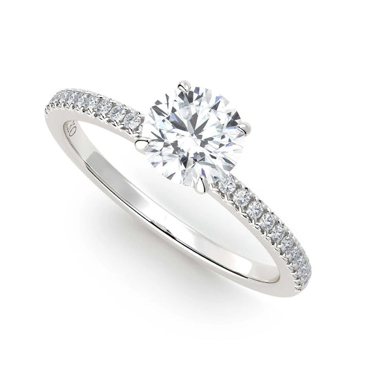 Suokko Timanttikorut -timanttisormus valkokultaa, jossa istutettuna 25 timanttia. Tuotekoodi KR19039BR75