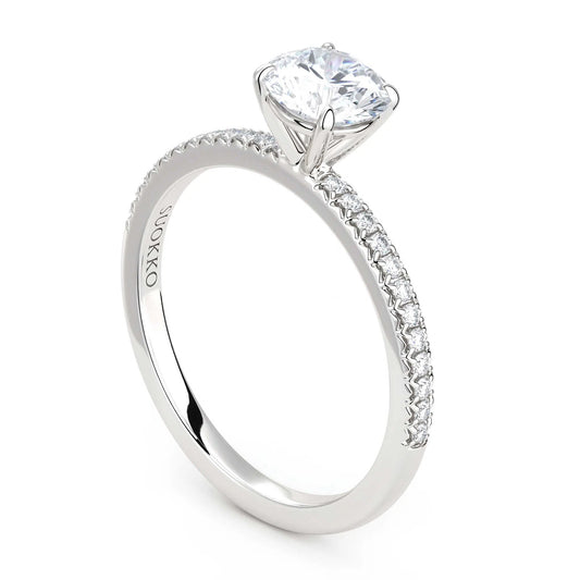 Suokko Timanttikorut -timanttisormus valkokultaa, jossa istutettuna 25 timanttia. Tuotekoodi KR19039BR75