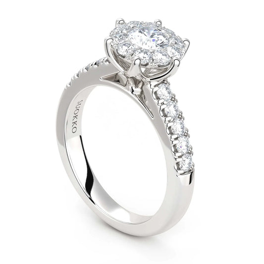 Suokko Timanttikorut -timanttisormus valkokultaa, jossa istutettuna 21 timanttia. Tuotekoodi KR19106